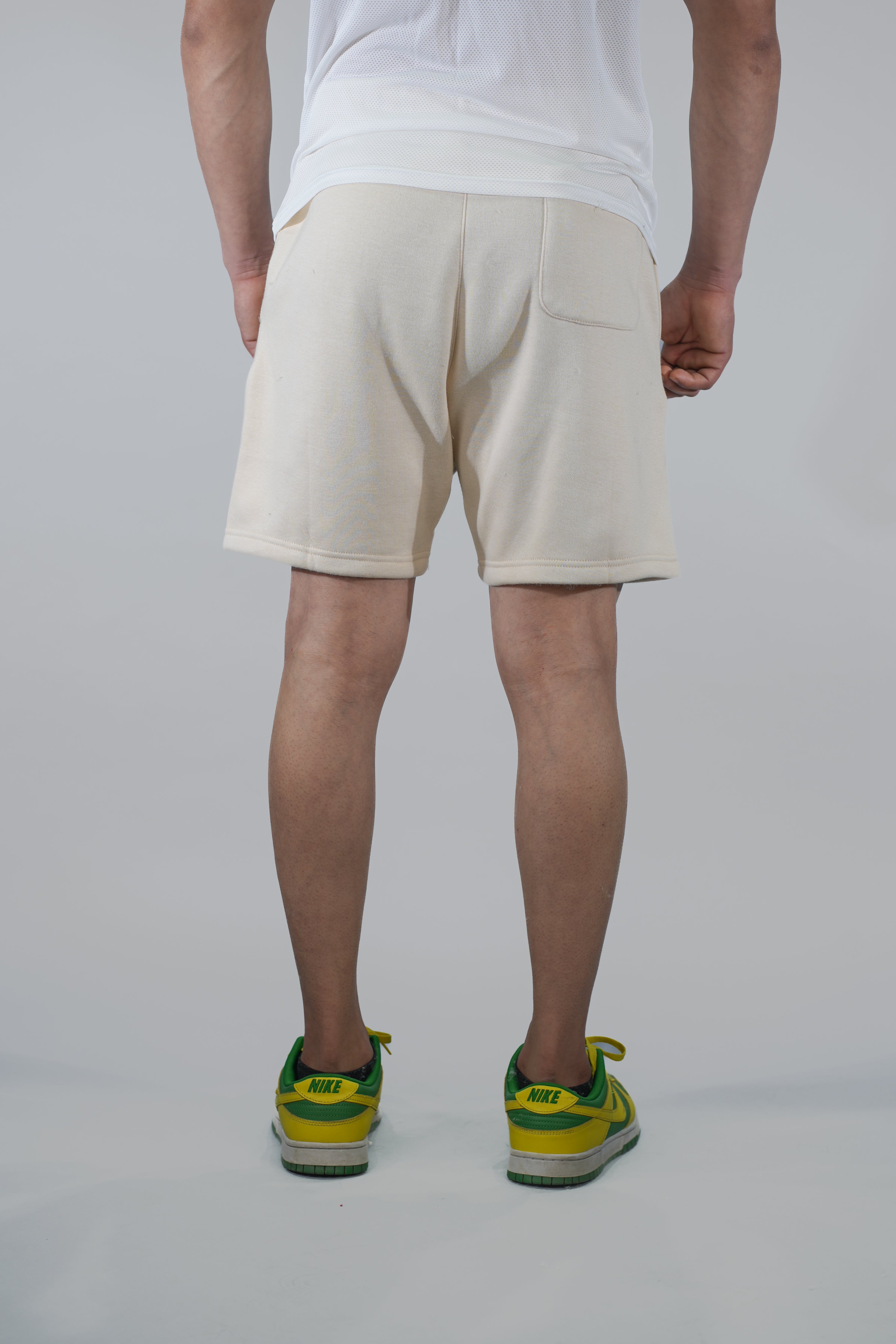 Cream Solid Relaxed Fit Shorts